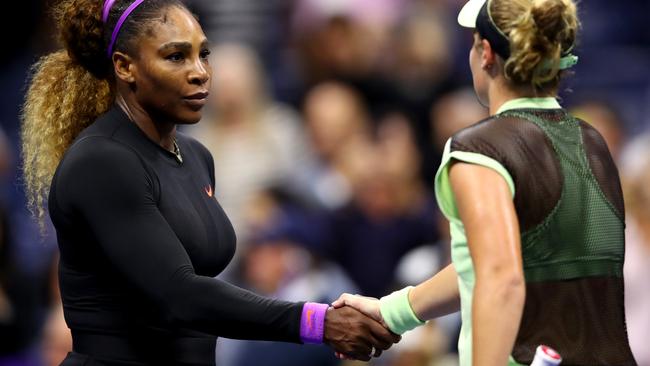 Serena Williams greets Catherine McNally at the net after their match. Picture: Getty Images