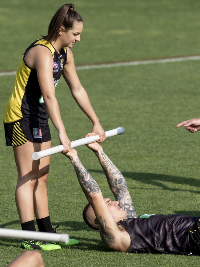 Monique Conti and Dustin Martin work together. Picture: Jay Town