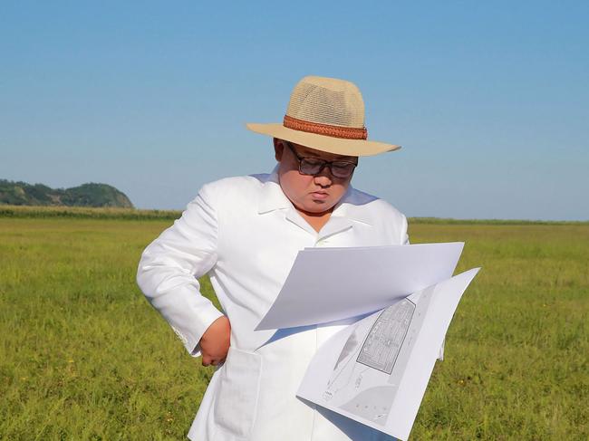 This undated picture released by North Korea's official Korean Central News Agency (KCNA) on August 18, 2018 via KNS shows Kim Jong Un inspecting the construction preparations for the Onpho greenhouse farm in Kyongsong County in North Hamgyong Province. (Photo by KCNA VIA KNS / KCNA VIA KNS / AFP) / - South Korea OUT / REPUBLIC OF KOREA OUT   ---EDITORS NOTE--- RESTRICTED TO EDITORIAL USE - MANDATORY CREDIT "AFP PHOTO/KCNA VIA KNS" - NO MARKETING NO ADVERTISING CAMPAIGNS - DISTRIBUTED AS A SERVICE TO CLIENTS THIS PICTURE WAS MADE AVAILABLE BY A THIRD PARTY. AFP CAN NOT INDEPENDENTLY VERIFY THE AUTHENTICITY, LOCATION, DATE AND CONTENT OF THIS IMAGE. /