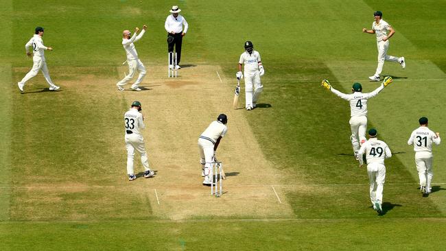 Australia's Nathan Lyon celebrates with teammates after the dismissal of India's Mohammed Siraj to secure the Test World Championship title Picture: AFP