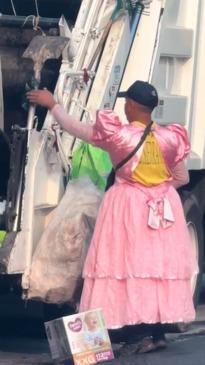 Bin men don princess dresses to collect rubbish