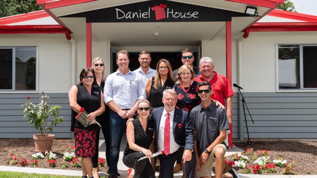 The Murphy Builders team with Bruce and Denise Morcombe at Daniel House.