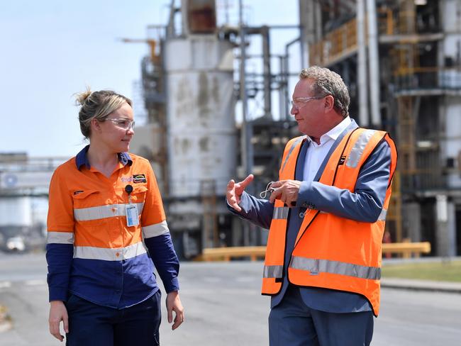 Incitec Pivot worker Christie Rossi (left) is seen with Andrew 'Twiggy' Forrest from Fortescue Future Industries during a hydrogen announcement at Incitec Pivot on Gibson Island in Brisbane, Monday, October 11, 2021.. The Queensland government announced that Incitec Pivot has reached an agreement with Fortescue Future Industries to study the feasibility of green ammonia production at Incitec Pivot's Gibson Island production facility in Brisbane. (AAP Image/Darren England) NO ARCHIVING