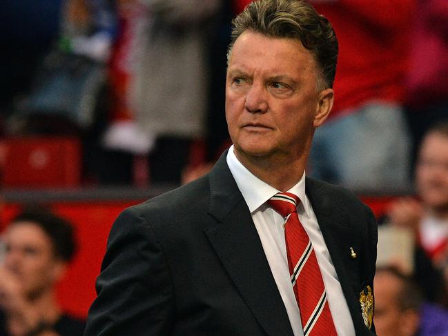 Manchester United's Dutch manager Louis Van Gaal leaves after the English Premier League football match between Manchester United and Queens Park Rangers at Old Trafford in Manchester, north west England on September 14, 2014. Manchester United won the game 4-0. AFP PHOTO/PAUL ELLIS RESTRICTED TO EDITORIAL USE. No use with unauthorized audio, video, data, fixture lists, club/league logos or “live” services. Online in-match use limited to 45 images, no video emulation. No use in betting, games or single club/league/player publications.