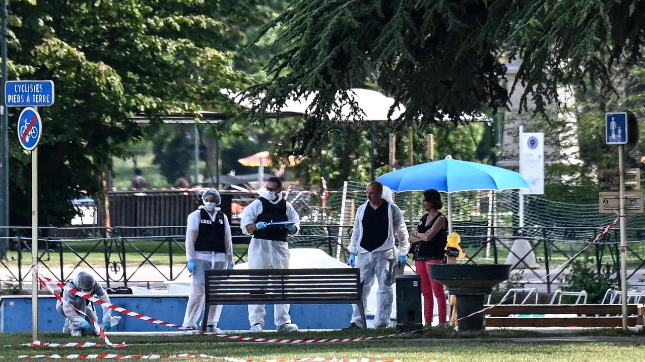 French forensic police officers work at the scene in Annecy. Picture: Olivier Chassignole/AFP