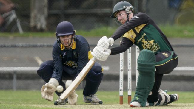 Robbie Cox hits it through cover for Bayswater. Picture: Valeriu Campan