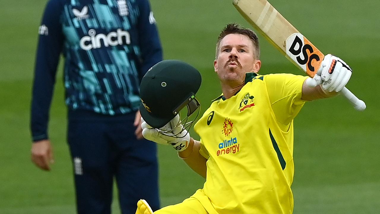 David Warner celebrates reaching his century . ( (Photo by Quinn Rooney/Getty Images)