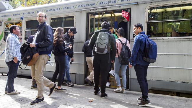 People in Melbourne’s busy free tram zone. Picture: Sarah Matray