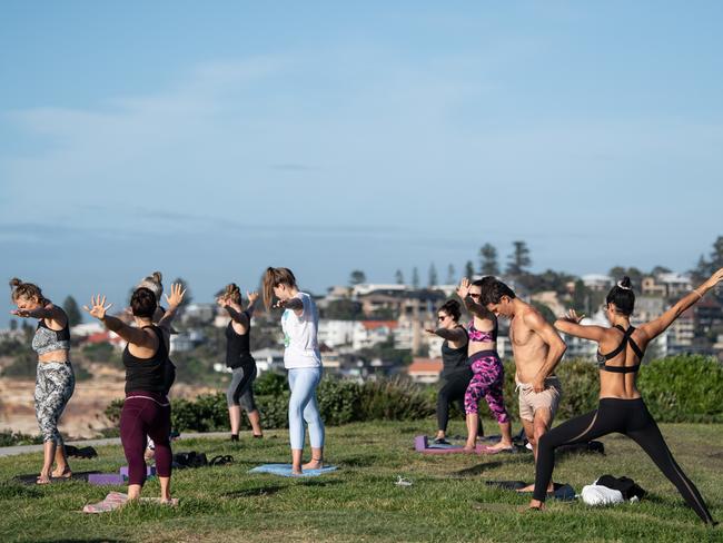 A group doing yoga near Bondi Beach. Picture: AAP