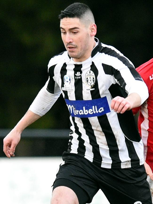 Nicholas Symeoy in action for Moreland Zebras.