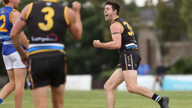 Will Young celebrates one of his three goals for Caroline Springs. Picture: Local Legends Photography