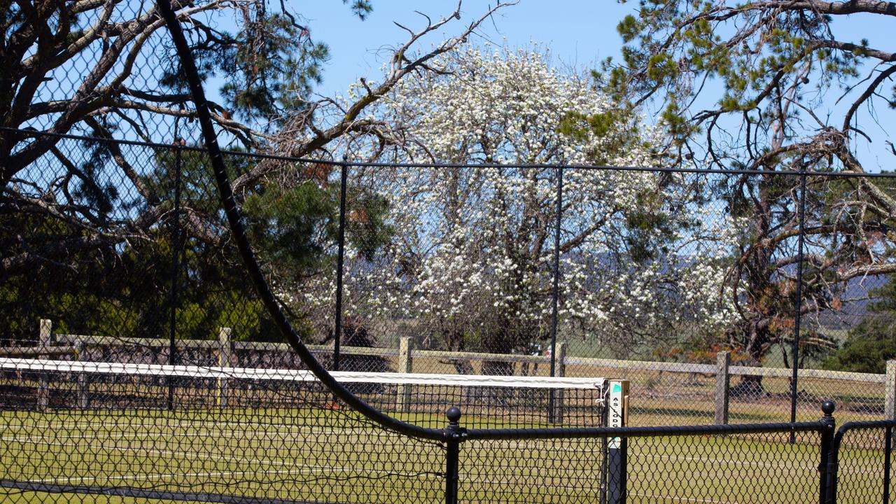 Outside, there is a championship size grass tennis court and a three-bedroom brick veneer manager’s residence.