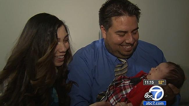 A now-healthy Hope with her mum and dad. Picture: Screengrab, ABC7