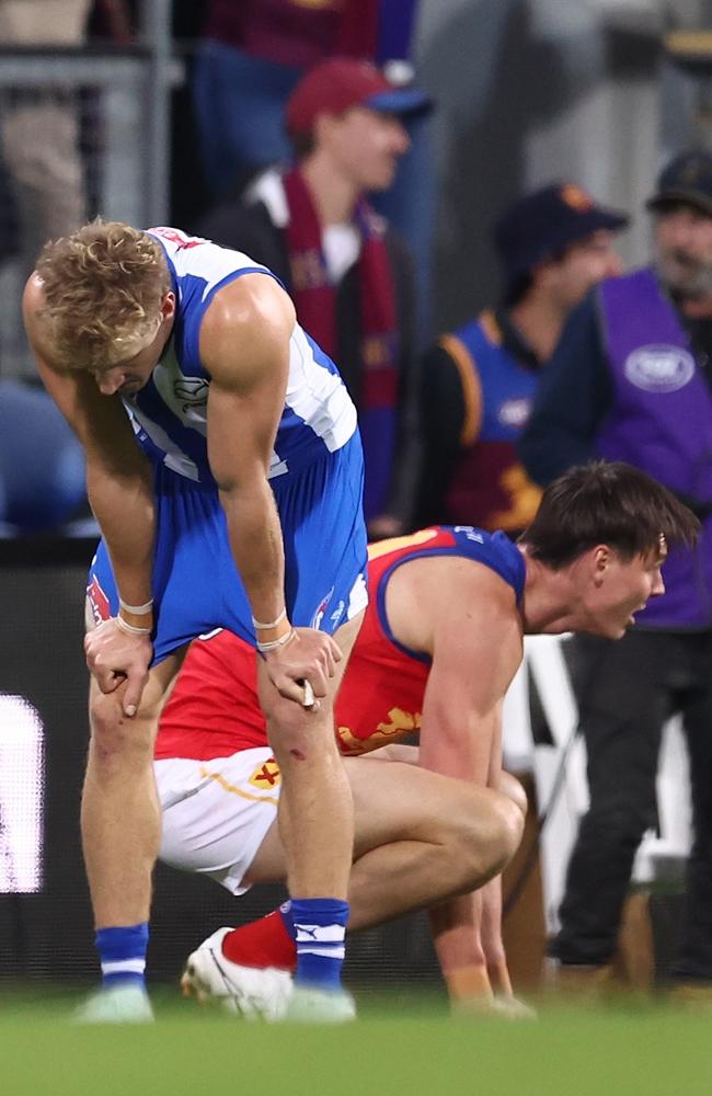 The Roos and Lions were all tied up at the end of the game. Picture: James Wiltshire/AFL Photos via Getty Images.