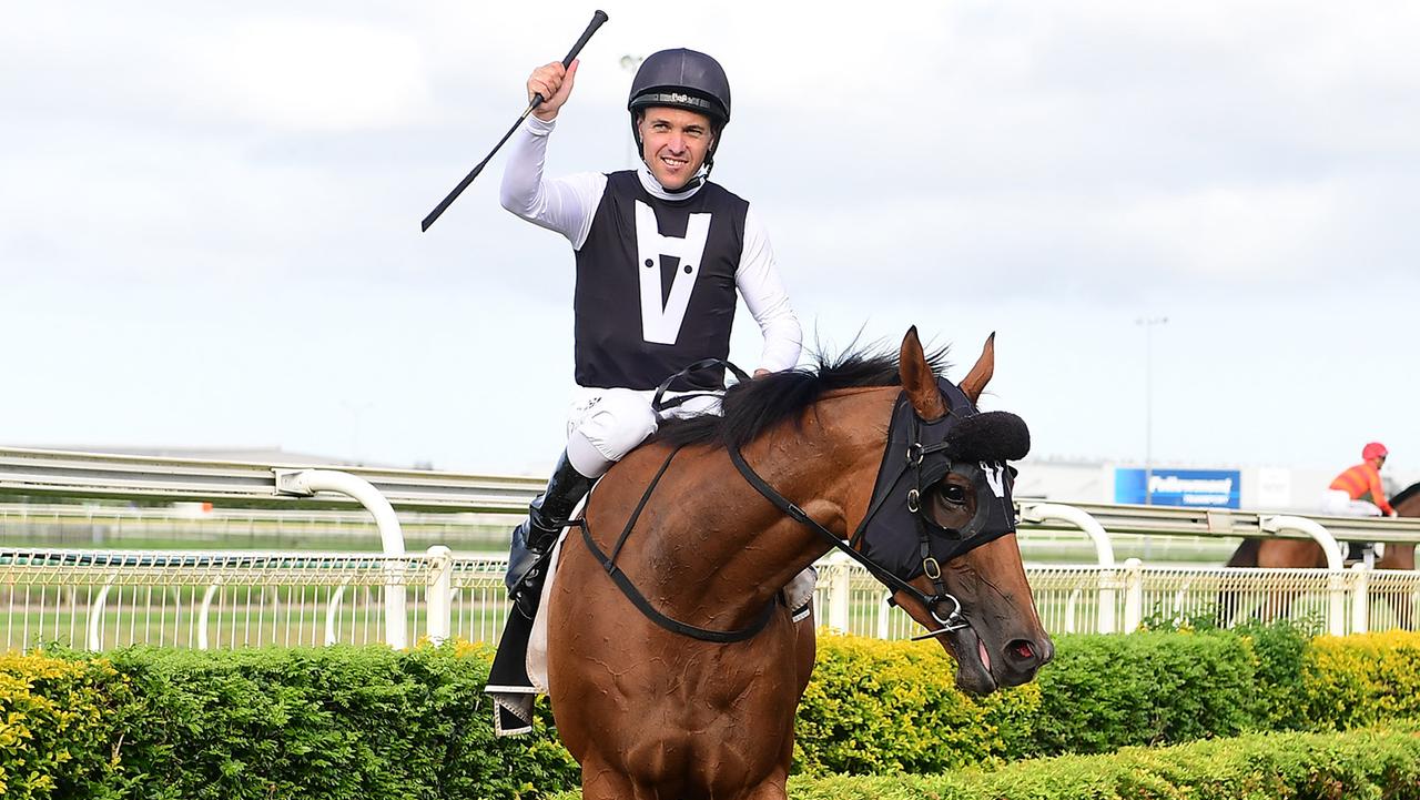 Trainer Tony Gollan and jockey Ryan Maloney after isotope won the Gold Edition Plate beating Away Games at Doomben. Picture: Trackside Photography