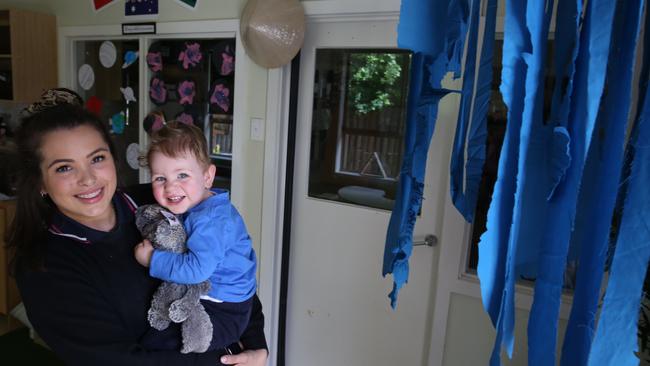 Ms Murphy in the babies’ room with Charlie. Picture: Stuart Milligan