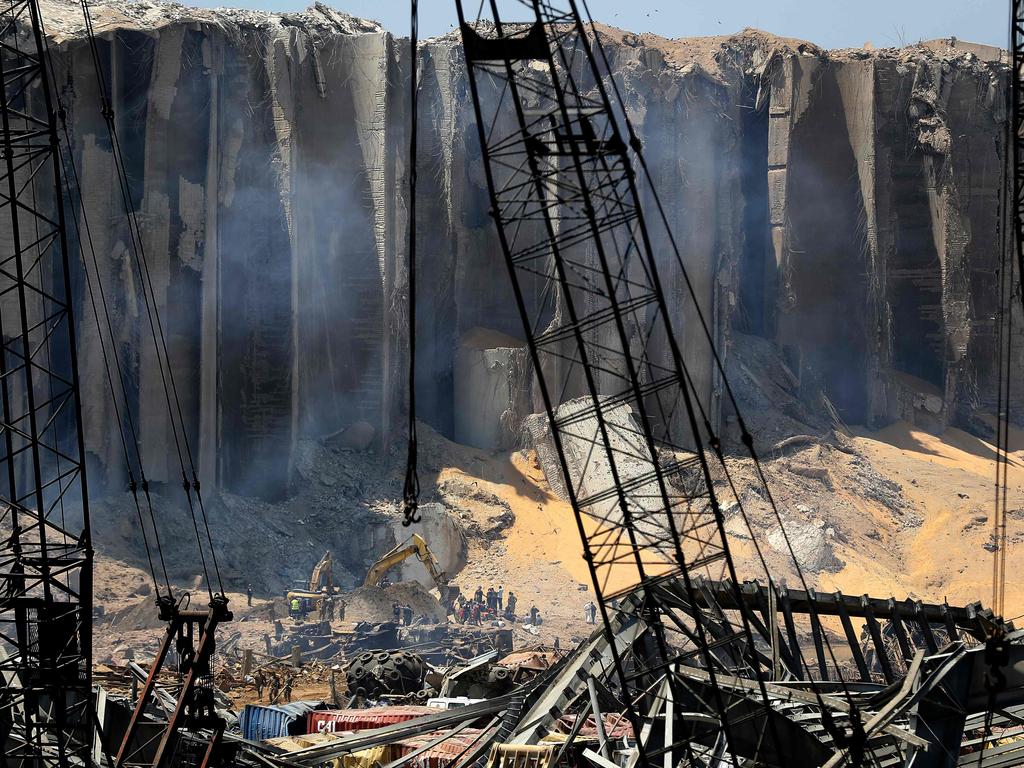 Rescuers and civil defence gather at Beirut’s port to search for survivors. Picture: JOSEPH EID / AFP