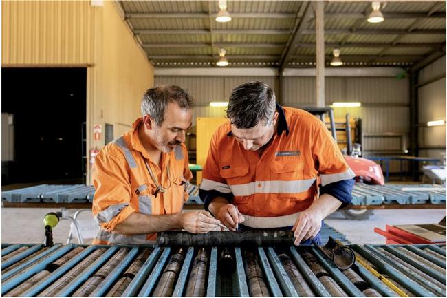 Geologists inspect core from the Maronan deposit, where 7000-10,000m of drilling is taking place this year. Pic: MMA