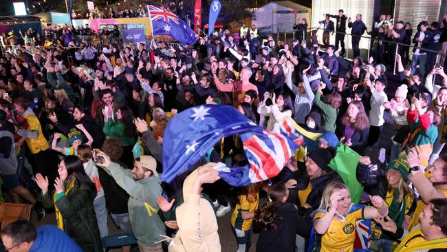 Matildas fans celebrate at Tumbalong Park, Darling Harbour, Australia Vs France Quarter final. Picture: Damian Shaw