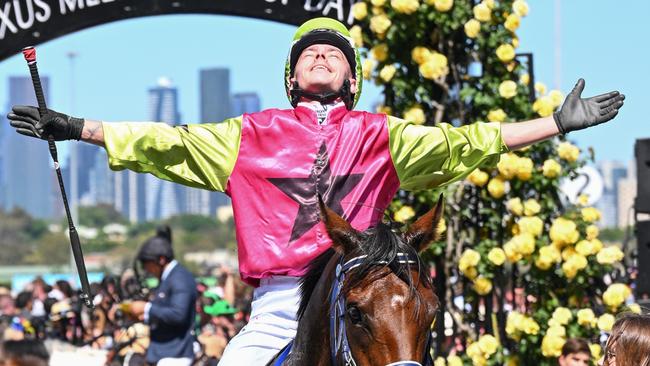 MELBOURNE, AUSTRALIA - NOVEMBER 05: Robbie Dolan riding Knight's Choice reacts after winning Race 7, the Lexus Melbourne Cup - Betting Odds during Melbourne Cup Day at Flemington Racecourse on November 05, 2024 in Melbourne, Australia. (Photo by Vince Caligiuri/Getty Images)