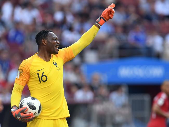 France's goalkeeper Steve Mandanda gestures. Pic: AFP