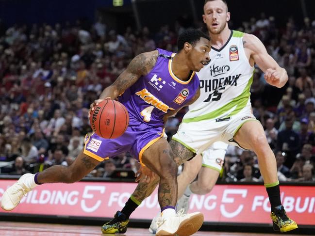 Import DeShon Taylor dribbles past Mitchell Creek on his way to a career-high 15 points.