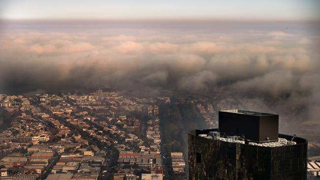 Melbourne fog rolling in off the bay yesterday, as seen from Eureka Skydeck. Picture: Alex Coppel