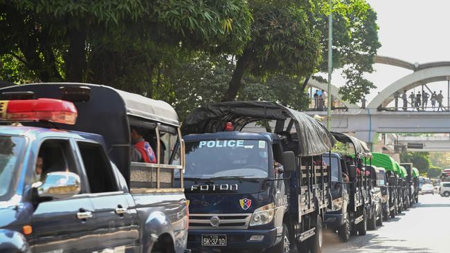 Police forces are pictured in a line of trucks in the downtown area of Yangon Myanmar's military detained the country's de facto leader Aung San Suu Kyi. Picture: AFP