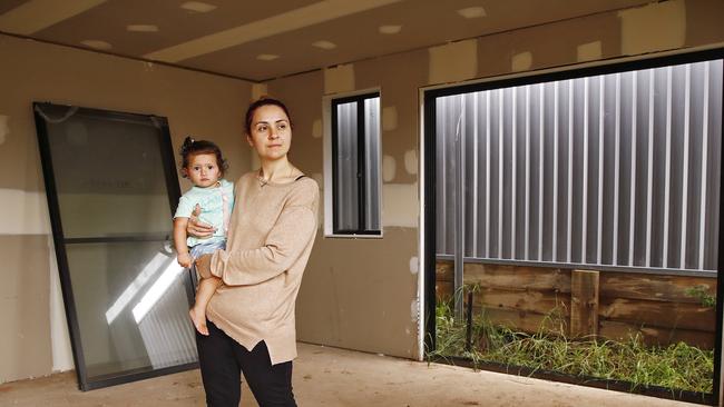 Silverdale resident Kayla Rosso with daughter Mariah at their property which she has been ordered to demolish. Picture: Sam Ruttyn