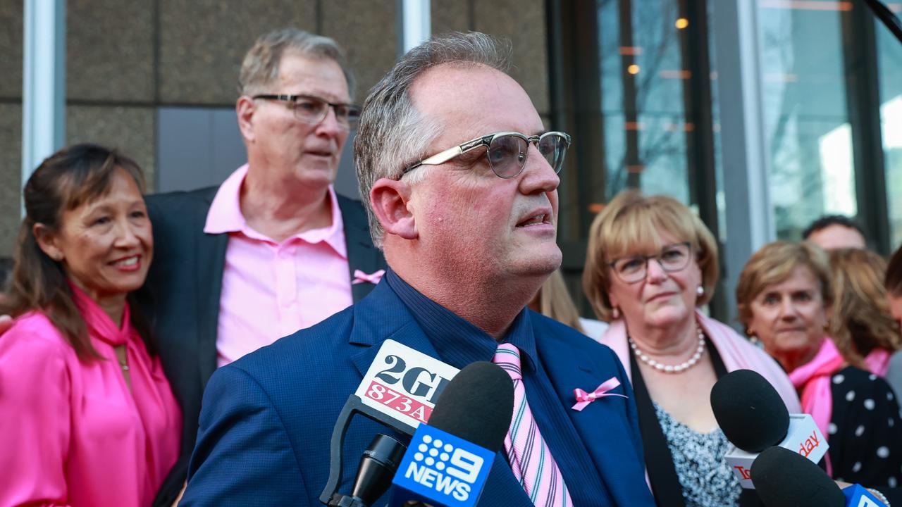 Journalist Hedley Thomas with Lynette Dawson’s family leave the Supreme Court, Sydney, after a guilty verdict was passed down in the Chris Dawson murder trial this week. Picture: Justin Lloyd.