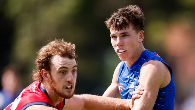 MELBOURNE, AUSTRALIA - FEBRUARY 22: Finn O'Sullivan of the Kangaroos and Jed Adams of the Demons compete during the 2025 AFL match simulation between the North Melbourne Kangaroos and Melbourne Demons at Arden Street on February 22, 2025 in Melbourne, Australia. (Photo by Dylan Burns/AFL Photos via Getty Images)