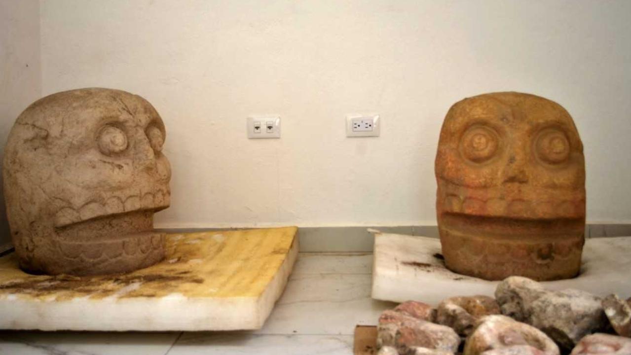 Two volcanic-rock 'skinned skulls' dedicated to Xipe Tótec — the flayed god of ancient Central America. Picture: Mexican Institute of Anthropology and History