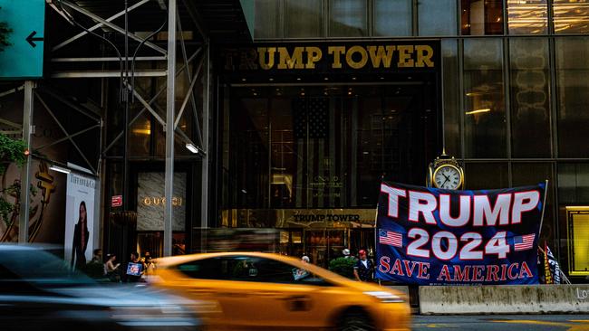 A Trump 2024 banner flys outside Trump Tower in New York after his Florida home was raided by the FBI. Picture: AFP