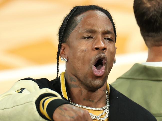 PARIS, FRANCE - AUGUST 08: American rapper and singer Travis Scott attends a Men's basketball semifinals match between Team United States and Team Serbia on day thirteen of the Olympic Games Paris 2024 at Bercy Arena on August 08, 2024 in Paris, France. (Photo by Arturo Holmes/Getty Images)