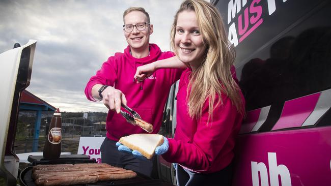 Mission Australia youth workers Joe McLennan and Naomi Cappelli with the youth outreach bus at the Clarendon Vale skate park. Picture: LUKE BOWDEN