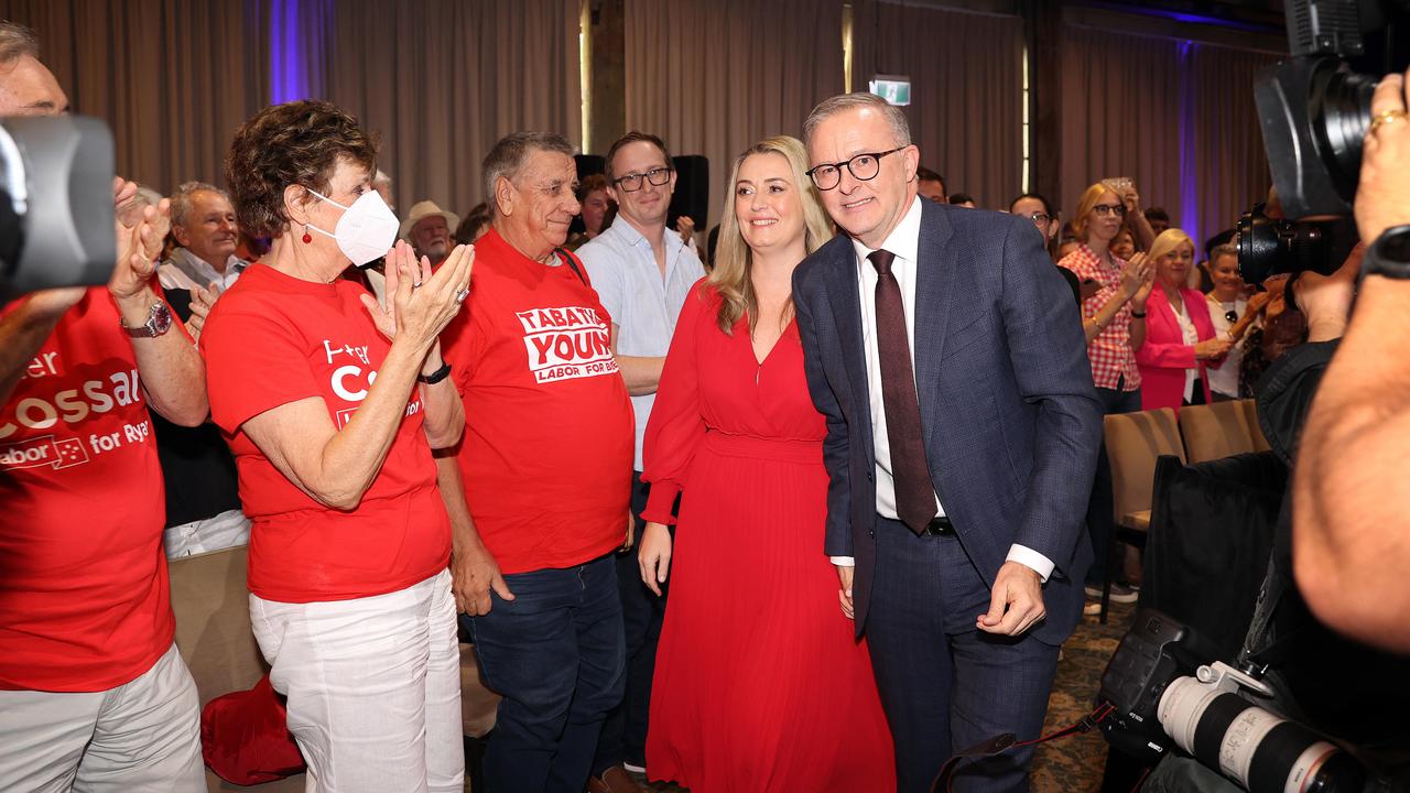 Anthony Albanese enters the Labor rally in Brisbane with partner Jodie Haydon. Picture: Sam Ruttyn