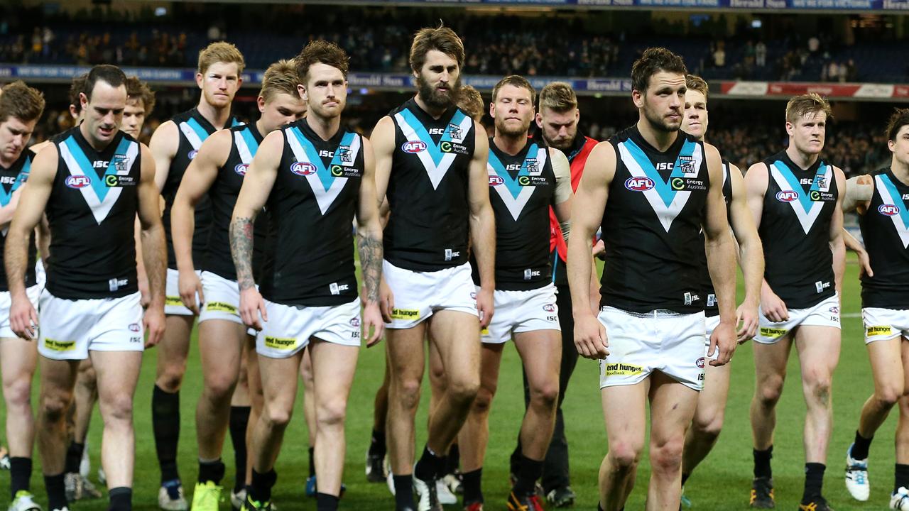 Travis Boak leading Port Adelaide off the field after the preliminary final lost to Hawthorn. Picture: Sarah Reed