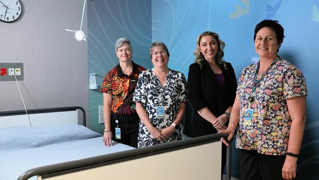 The Far North Queensland Hospital Foundation has raised $200,000 to develop a private room in the Cairns Hospital maternity ward for women and families that experience pregnancy and childbirth loss, along with a large mural painted at the entrance to the unit. Cairns Hospital pregnancy loss coordinator Lyn Graham, midwifery nursing director Mary McGuinness, Far North Queensland Hospital Foundation chief executive Gina Hogan and assistant midwife unit manager Jo Taylor experience the new room designed to comfort women and families experiencing pregnancy and childbirth loss. Picture: Brendan Radke