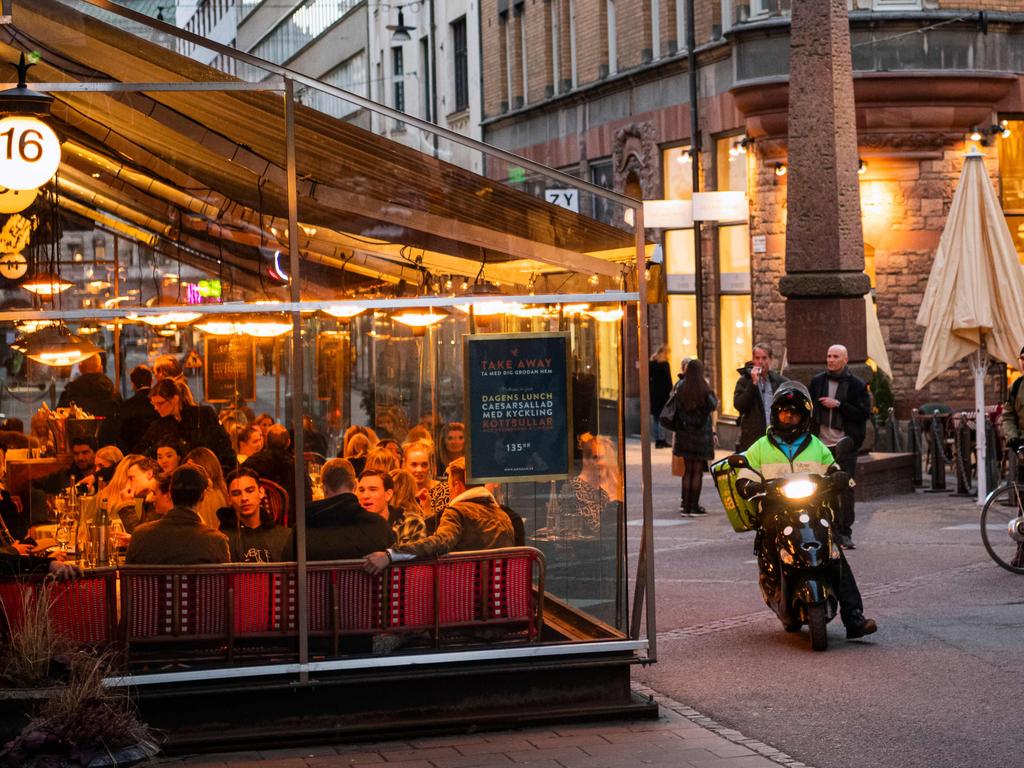 ‘Just act like adults’: Sweden goes it alone on COVID-19