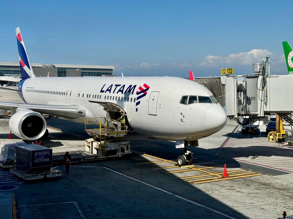 A LATAM plane sits at gate at Los Angeles Airport. Picture: Daniel Slim/AFP