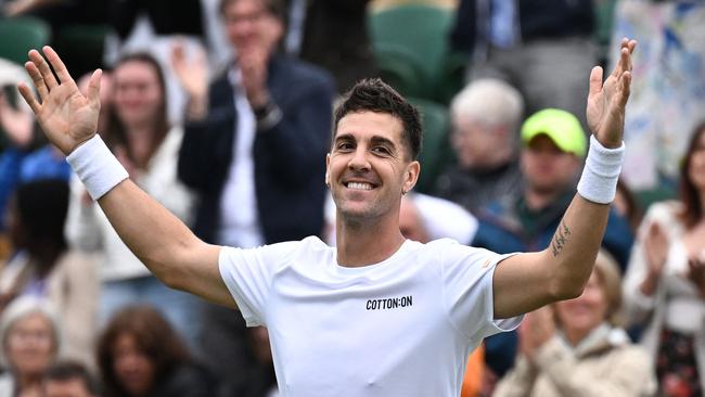 Australia's Thanasi Kokkinakis celebrates winning against Canada's Felix Auger-Aliassime during their men's singles first round tennis match on the third day of the 2024 Wimbledon Championships at The All England Lawn Tennis and Croquet Club in Wimbledon, southwest London, on July 3, 2024. (Photo by Ben Stansall / AFP) / RESTRICTED TO EDITORIAL USE