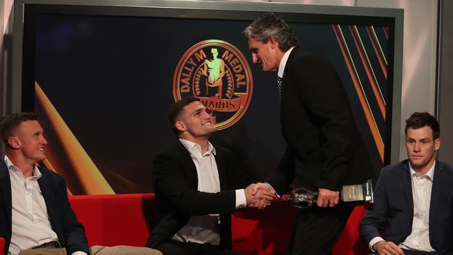 Well done, Dad! Nathan Cleary congratulates his father, Ivan, on his awards win.