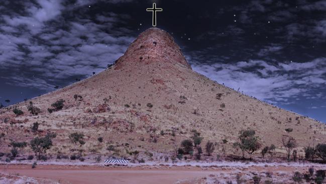 An artist's impression of a cross that Ken Duncan hopes will be constructed on Memory Mountain near Haasts Bluff. PICTURE: Walk a While