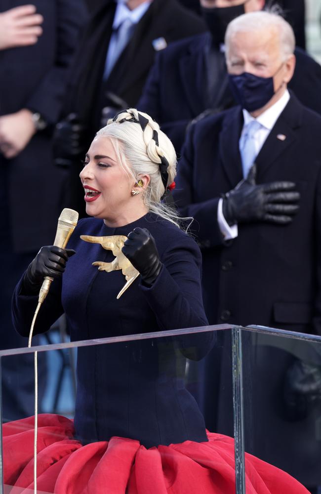 Lady Gaga sang the American national anthem as Joe Biden – and the world – watched on. Picture: Getty Images