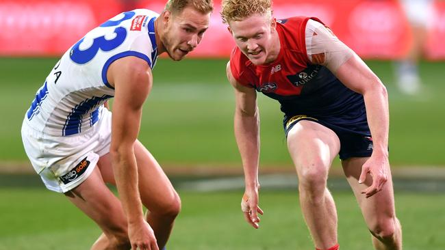 Adelaide, AUSTRALIA – AUGUST 09: Clayton Oliver of the Demons competes with James Jordon of the Demons during the round 11 AFL match between the Melbourne Demons and the North Melbourne Kangaroos at Adelaide Oval on August 09, 2020 in Adelaide, Australia. (Photo by Mark Brake/Getty Images)