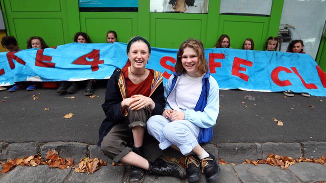 Castlemaine secondary college students Harriet O'Shea Carre, left, with Milou Albrecht during a sit-in outside Bill Shorten’s electoral office protesting inaction on climate change. Picture: Aaron Francis/The Australian