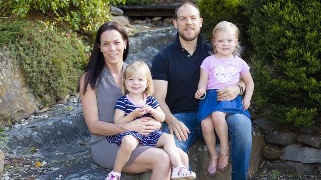 AFL Tasmania CEO Trisha Squires and her husband Jake and daughters Holly, 2, and Harper, 3. Picture: RICHARD JUPE