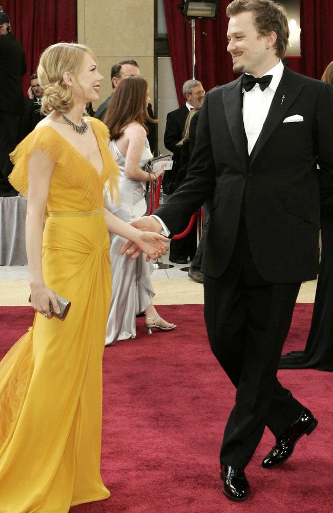 Michelle Williams (L) dances on the red carpet with her fiance Heath Ledger in 2006. Picture: Supplied