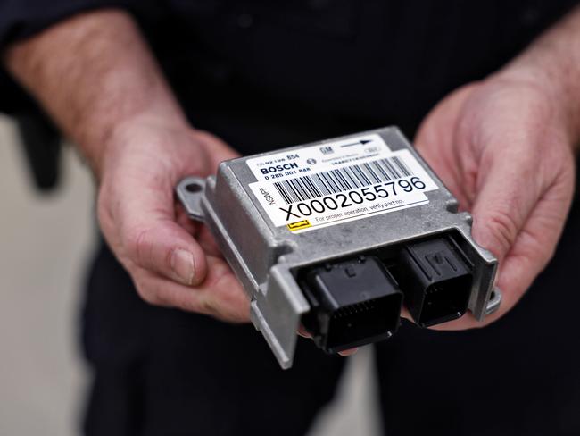 An airbag control module removed from a crashed car. Picture: Sam Ruttyn