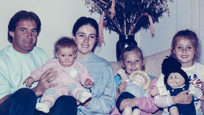 Chris Dawson with his partner, Joanne Curtis, and their baby Kristin, with Mr Dawson’s daughters to his missing wife Lyn, Shanelle and Sherryn, in 1985.